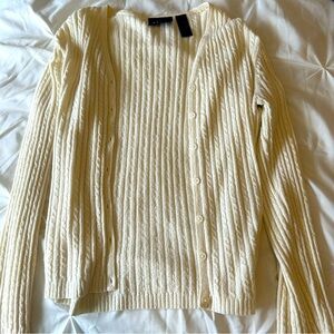 Creme colored cardigan sweater with textured lines